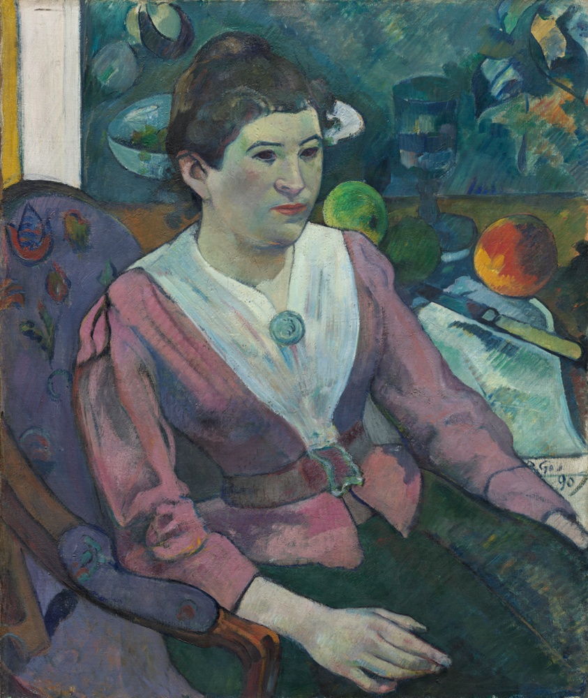 セザンヌの静物画の前の女