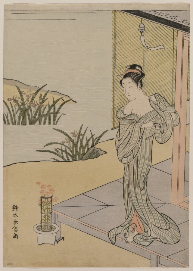 撫子の鉢を見る娘