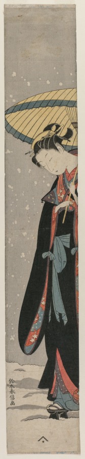Young Woman Walking in Snow with Umbrella