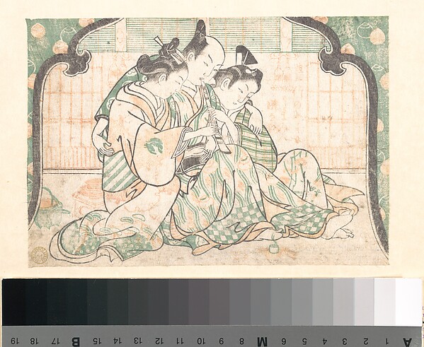 A Young Man Seated between Two Women