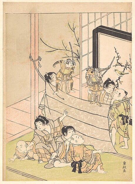 Young Boys Performing a Puppet Show