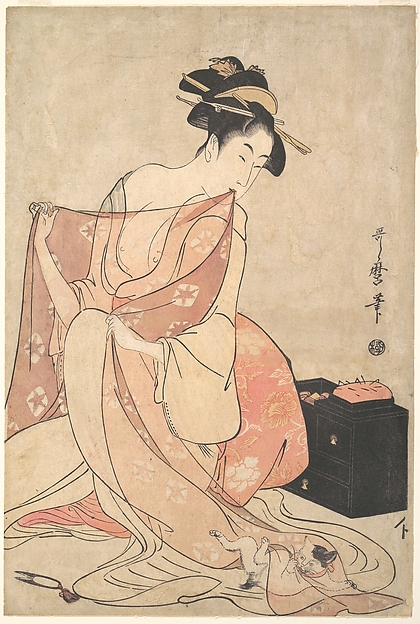女と猫