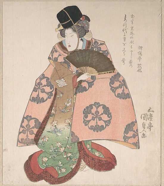 扇を持って立つ女形
