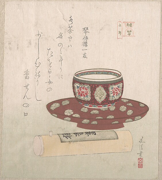 茶碗と筒に入った粉菓子