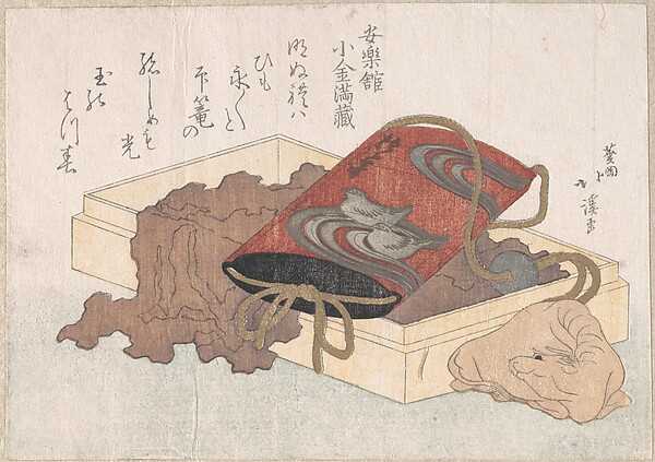 水鳥蒔絵の印籠と牛形根付（春雨集　巻三より）