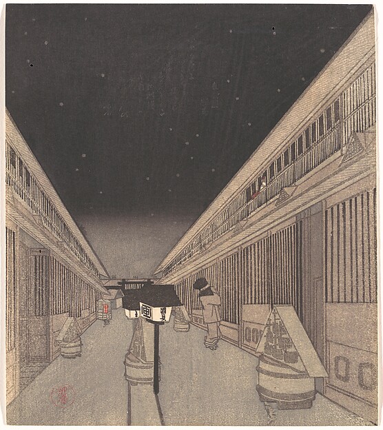 星明かりの夜の吉原の大通り