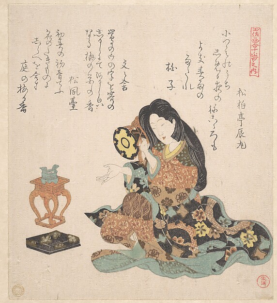 鼓を打つ女