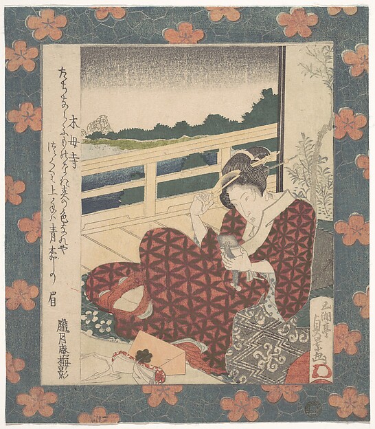 鏡に映る姿を見る美人