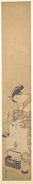 床に座して文を書く花魁
