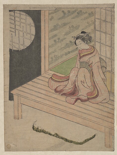 家の縁側に座る娘