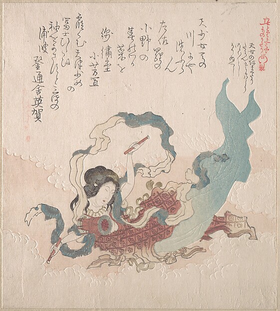 神の姿で太鼓を打つ娘