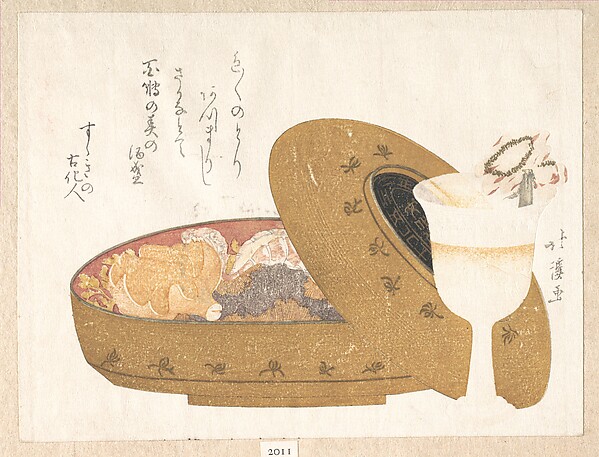 盃と正月の料理を詰めた重箱