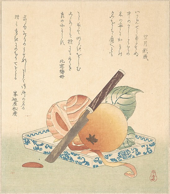 皿の上の柿