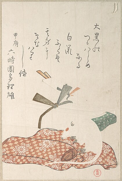 白鼠と反物の束